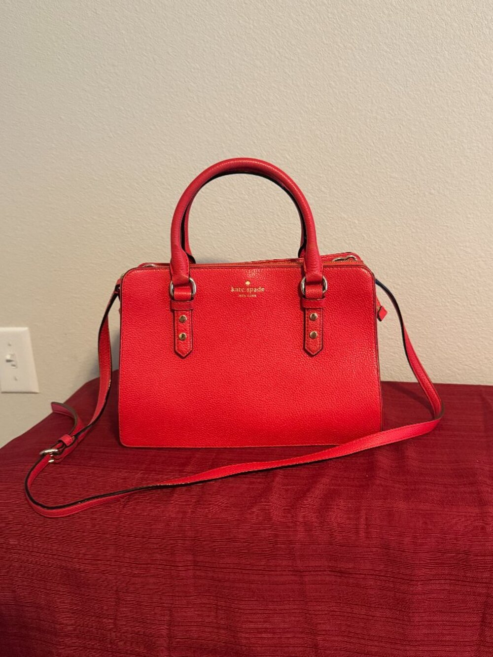 Kate Spade Red/Poppy color Pebble Leather Gold hardware zipper and 2 snap sectio